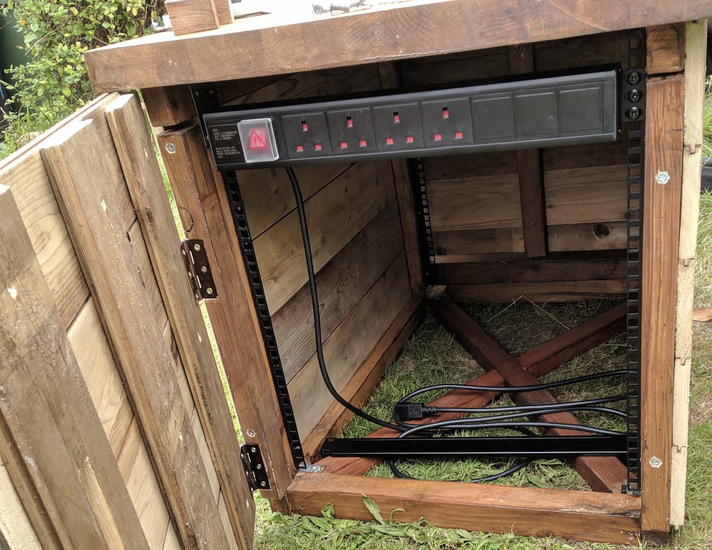 Inside the server cabinet, showing the cross brace and all the internal walls