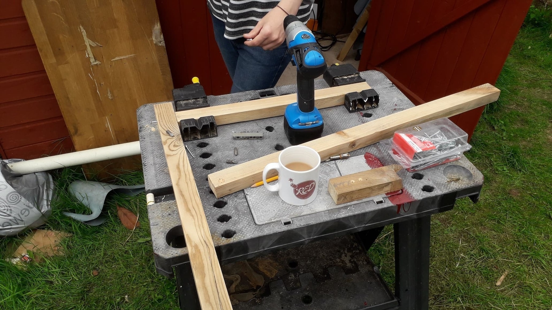 Three basic sticks of wood which are beginning a frame